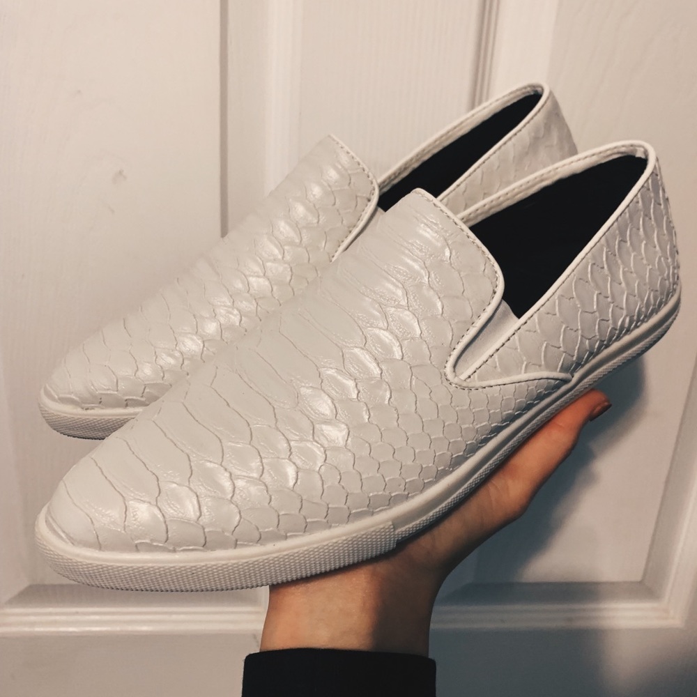 white qupid slip ons